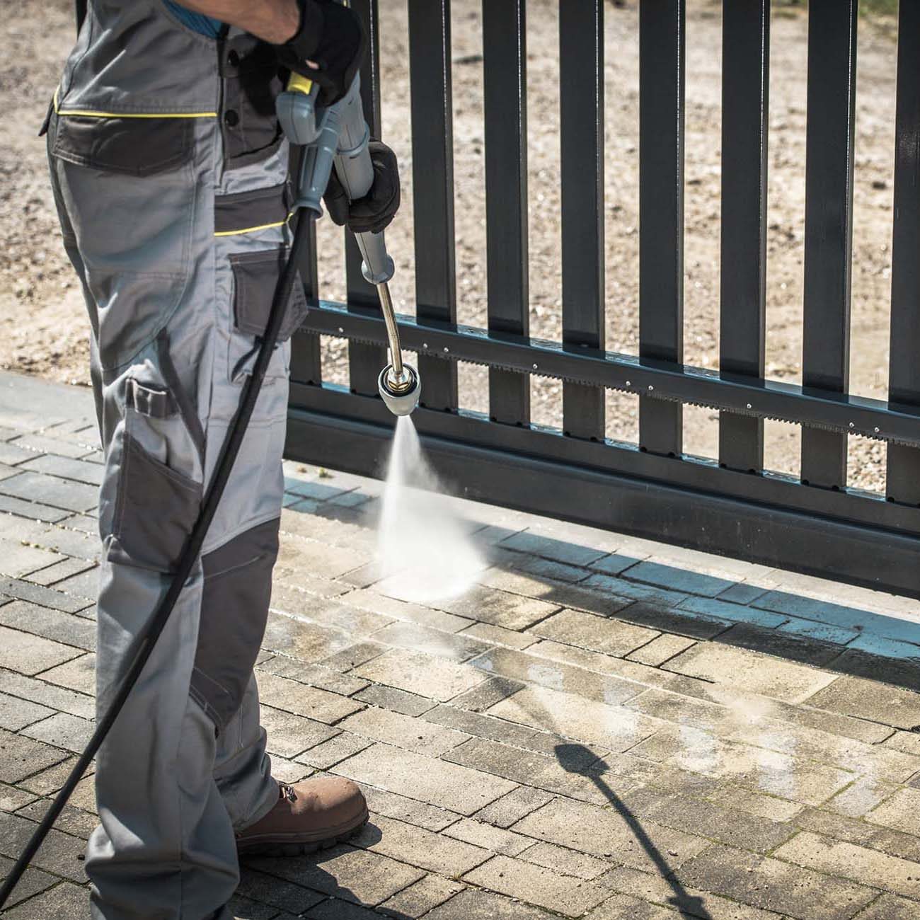 Man cleaning House Surroundings